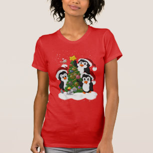 Christmas Penguins around the christmas tree T-Shirt