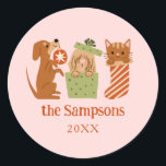 Christmas Pets Pink Classic Round Sticker<br><div class="desc">Cute and festive Christmas favour sticker featuring hand drawn illustration of cats and dogs in holiday theme. The background is pink.</div>