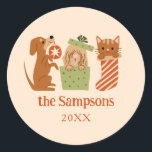 Christmas Pets Yellow Classic Round Sticker<br><div class="desc">Cute and festive Christmas favour sticker featuring hand drawn illustration of cats and dogs in holiday theme. The background is yellow.</div>