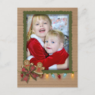 Christmas photo frame on cardboard holiday postcard