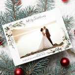 Christmas Photo Watercolor Berries and Boughs Holiday Card<br><div class="desc">Celebrate the season with this beautiful holiday card featuring your photo framed by lovely hand painted botanical swags.  Add your custom greeting like Merry Christmas,  Happy Holidays,  Happy New Year,  etc.  Festive and Beautiful yet simple and rustic - the perfect card for newly married couples or families.</div>