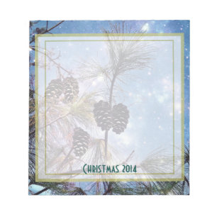 Christmas Pine cones under a starry night sky Notepad