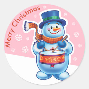 Christmas pink round sticker Snowman drummer.