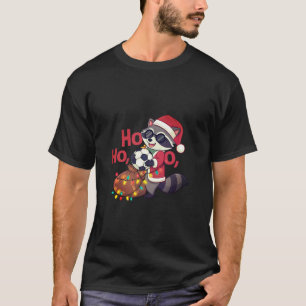 Christmas raccoon stealing a soccer ball T-Shirt
