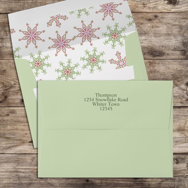 Christmas Red Green Whimsical Snowflake Colourful Envelope (Christmas holiday envelope with red and green snowflakes. )