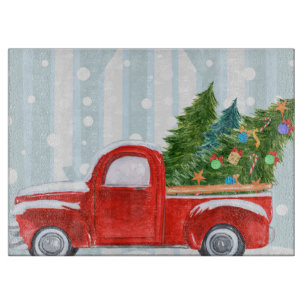 Christmas Red PickUp Truck on a Snowy Road Cutting Board