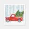 Christmas Red PickUp Truck on a Snowy Road