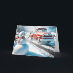 Christmas Red Retro Truck With Snowman Holiday Card<br><div class="desc">A cheerful snowman stands beside a road as a vintage red truck drives by in a snowy landscape</div>
