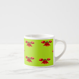 Christmas red ribbon on bright green espresso cup