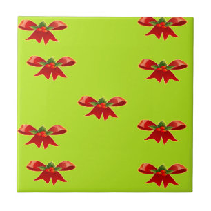 Christmas red ribbon on bright green tile