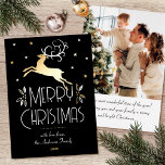 Christmas Reindeer Custom Photo Black White Gold Foil Holiday Card<br><div class="desc">Luxury gold foil Christmas cards with an Art Deco style and your own personalised photo on the back. This elegant template features a leaping reindeer with festive leaves, berries and stars. A stylish colour palette of black, white and real foil elements in gold, silver or rose gold. The text can...</div>