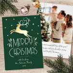 Christmas Reindeer Custom Photo Forest Green Gold Foil Holiday Card<br><div class="desc">Elegant gold foil Christmas cards with an Art Deco style and your own personalised photo on the back. This editable template features a leaping reindeer with festive leaves, berries and stars. A stylish colour palette of bluedark forest green, white and real foil elements in gold, silver or rose gold. The...</div>