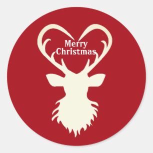 Christmas reindeer silhouette on red classic round sticker