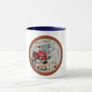 Christmas Santa flying a old aeroplane Mug