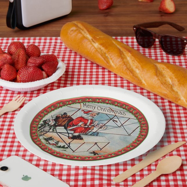 Christmas Santa flying a old aeroplane Paper Plate (Picnic)
