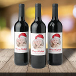 Christmas Santa Holiday Cute Simple Whimsical Hat Wine Label<br><div class="desc">Jolly Santa Claus and whimsical and cute Jolly Elf from the North Pole. This design features Christmas holiday modern photo cute, simple Santa merry Christmas hat, classic traditional rustic north pole, minimalist chic fun hand-drawn, whimsical Santa Claus party favour, old fashion simple Xmas, a classic family name typography font, whimsical...</div>