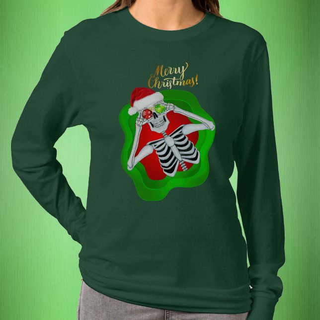 Christmas Silly Skeleton Santa Hat Spatter shape T-Shirt (Fun Skeleton in Santa Hat in splatter shape with Gold Merry Christmas text on green womans shirt.)