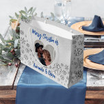Christmas silver snow blue photo heart large gift bag<br><div class="desc">Faux silver background. Decorated with snowflakes. Personalise and add your name(s). Heart shaped photo frame. Blue text.</div>