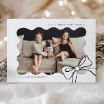 Christmas Simple Bow Black and White Photo Holiday Card<br><div class="desc">This festive black and white Christmas card features a stylish elegant bow and a trendy wavy centre photo. The simple back includes an editable Christmas greeting message with your custom name,  and is sure to have friends and family ready to celebrate this happy holiday season!</div>