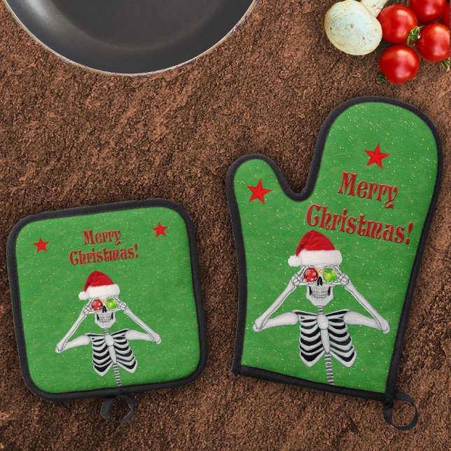 Christmas Skeleton Ornaments Stars on Green Oven Mitt & Pot Holder Set (Happy skeleton holding ornaments Santa Hat red stars on green Christmas pot holder and oven mitt set)