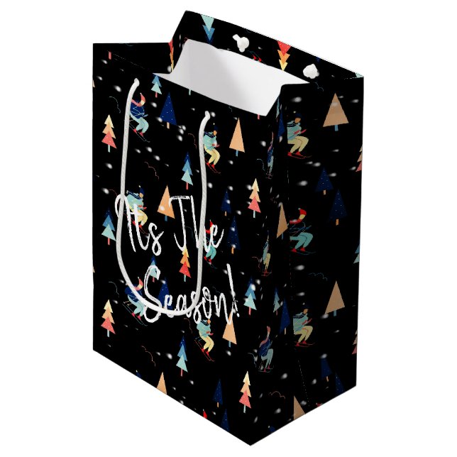 Christmas Skier In Snowflakes On Black Medium Gift Bag (Front Angled)