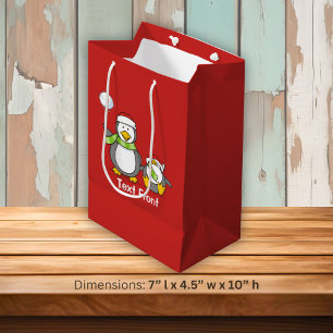 Christmas Snowballing penguins Medium Gift Bag