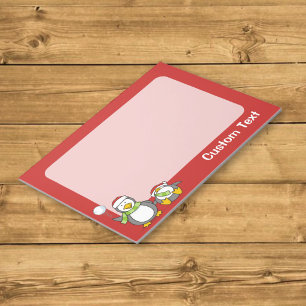 Christmas Snowballing penguins Notepad