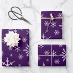 Christmas Snowflake On Purple Wrapping Paper Sheet<br><div class="desc">Vector art design of white Christmas snowflakes on on a purple background.</div>