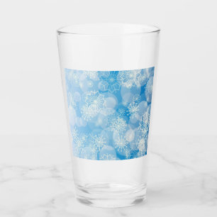 Christmas snowflakes on a blue background glass