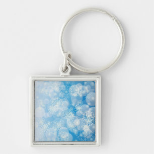 Christmas snowflakes on a blue background key ring