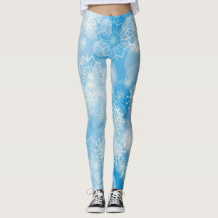 Christmas snowflakes on a blue background leggings