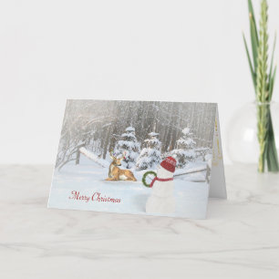Christmas snowman and deer in winter woods holiday card