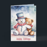 Christmas Snowman And Teddy Bear Holiday Card<br><div class="desc">Cute watercolor brown teddy bear in snowflakes with snowman.
Text is editable.</div>