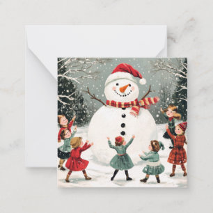 Christmas snowman in winter wonderland scene card