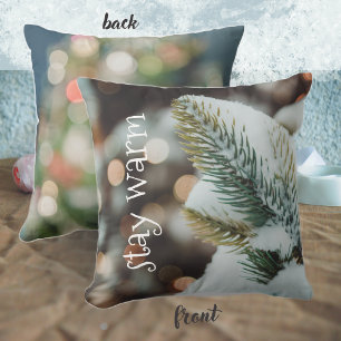 Christmas spruce branch and winter lights cushion