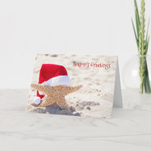 Christmas starfish in beach sand card
