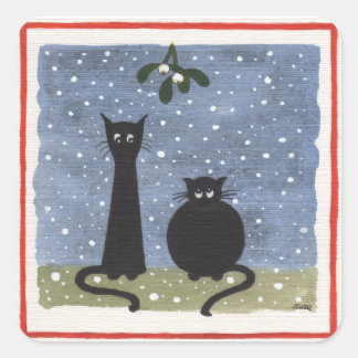 Christmas stickers of two black cats