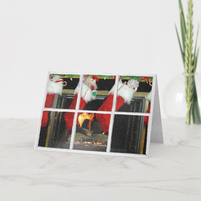 Christmas stocking by fireplace in snowy window card (Front)