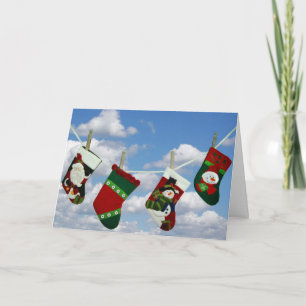 Christmas stocking on clothesline holiday card