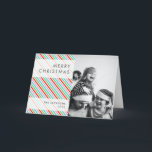 Christmas Stripes | Modern Colourful Cheerful Phot Holiday Card<br><div class="desc">Beautiful photograph holiday card with a simple, modern, minimalist “Merry Christmas” quote banner on a semi-transparent overlay over a stylish, cute diagonal christmas candy stripe background in striking shades of red, green, blue and pink in a modern, 'scandi 'scandinavian design style. This versatile card can be personalised with your own...</div>
