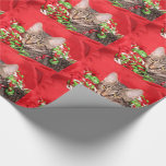 Christmas tabby kitty cat wrapping paper<br><div class="desc">Cute tabby kitty cat has found and started playing with Christmas decorations,  and having fun doing so,  cat lovers Christmas holiday wrapping paper</div>