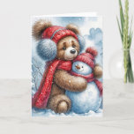 Christmas Teddy Bear Hugging a Snowman Holiday Card<br><div class="desc">Watercolor image of a cuddly teddy bear in red winter attire embraces a cheerful snowman in a snowy forest</div>