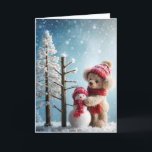 Christmas Teddy Bear With a Snowman Holiday Card<br><div class="desc">A cosy scene features a teddy bear dressed in a red hat and scarf beside a small snowman adorned with matching attire</div>
