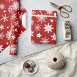 Christmas Theme Red White Snowflakes Pattern Wrapping Paper<br><div class="desc">This classic Christmas theme design features beautiful white snowflakes on a Christmas red background and is perfect for wrapping your presents during the holiday season.</div>