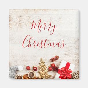 Christmas Themed Items on a Rustic Wooden Board Magnet