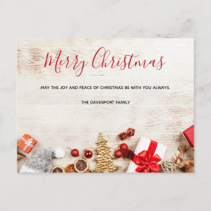 Christmas Themed Items on a Rustic Wooden Board Postcard