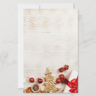 Christmas Themed Items on a Rustic Wooden Board Stationery