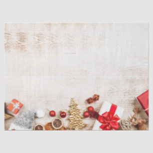 Christmas Themed Items on a Rustic Wooden Board Tissue Paper