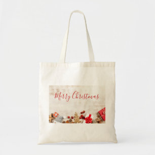 Christmas Themed Items on a Rustic Wooden Board Tote Bag