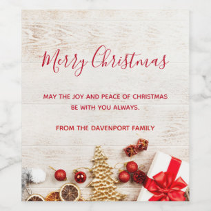 Christmas Themed Items on a Rustic Wooden Board Wine Label